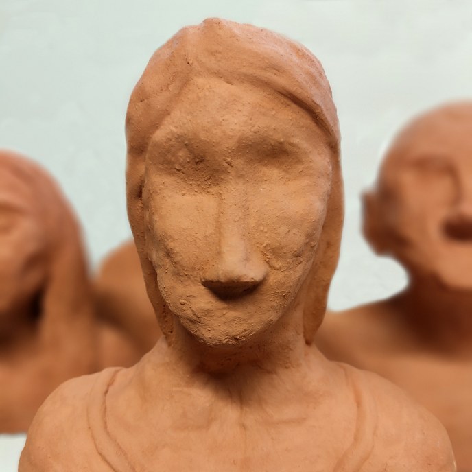 Orange clay sculptures